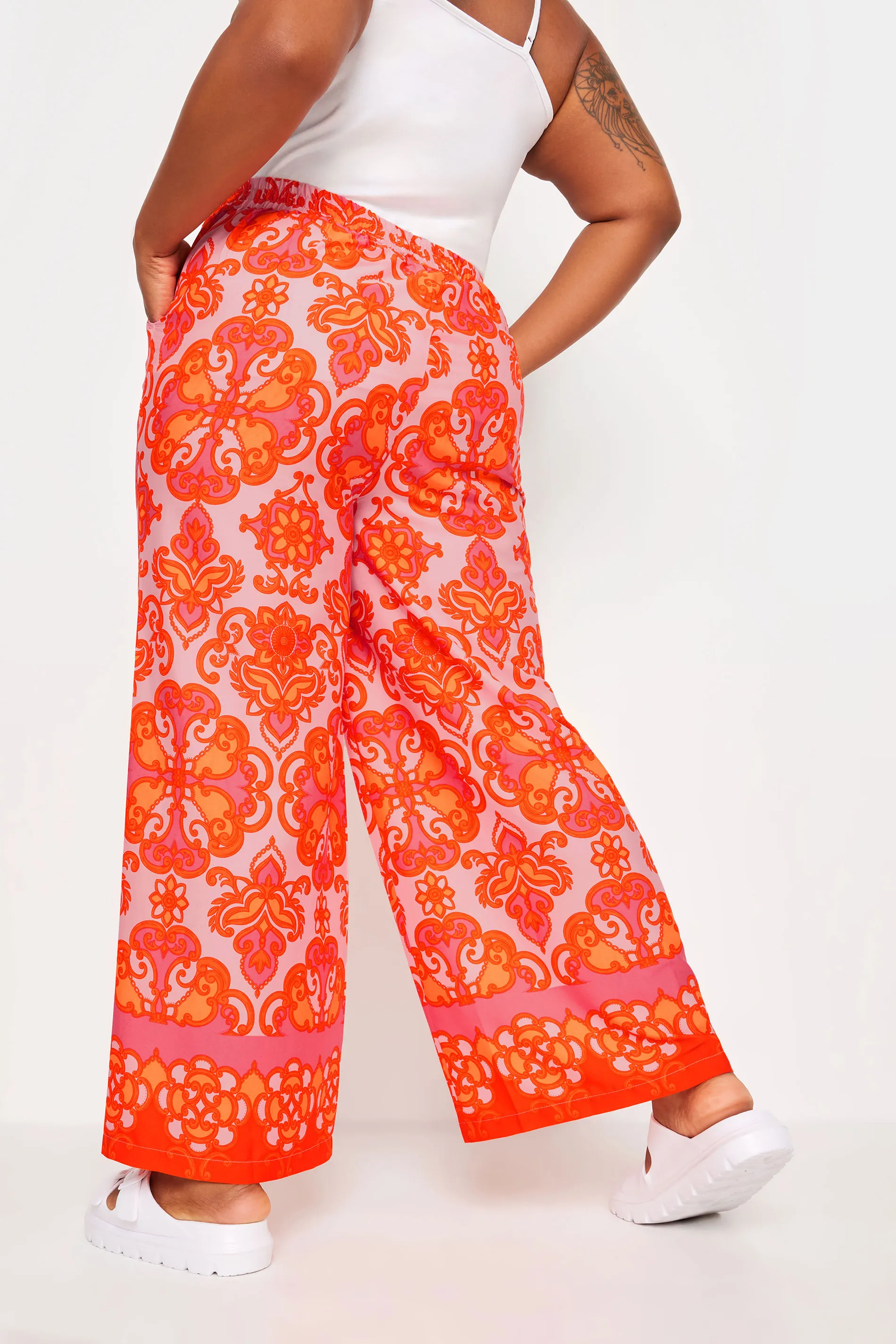 LIMITED COLLECTION Curve Orange Abstract Print Wide Leg Trousers