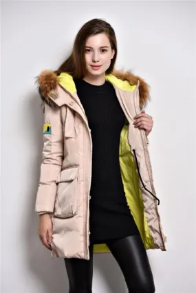 Long padded winter coat for women with fur hood and color contrast