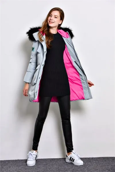 Long padded winter coat for women with fur hood and color contrast