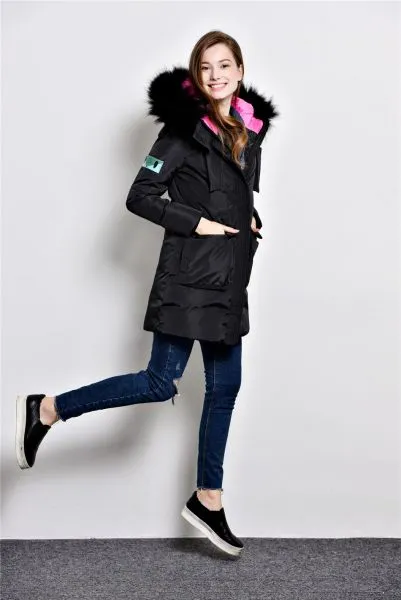 Long padded winter coat for women with fur hood and color contrast