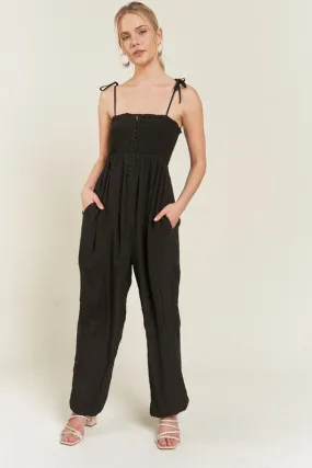 SMOCKED TIE STRAP JUMPSUIT